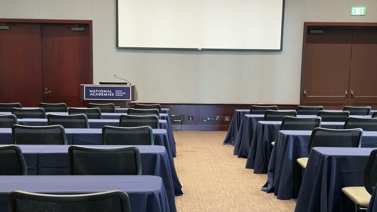 The Huntington Room, set in rows facing a projection screen.